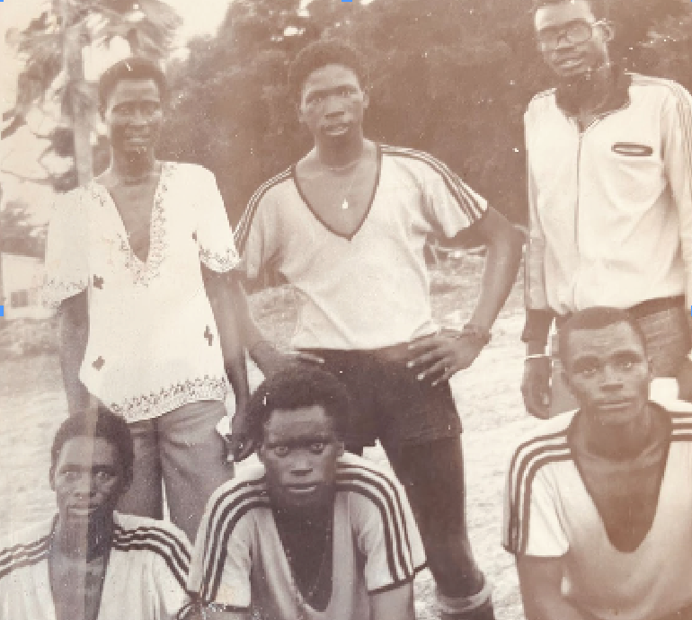 Guèye (center of bottom row) pictured after a club soccer practice. Photo: Mamadou Guèye.