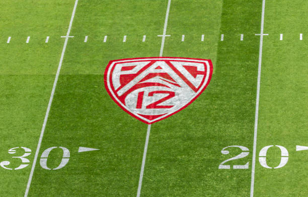 PALO ALTO, CA - SEPTEMBER 16:  A view of the Pac-12 logo on the field at Stanford Stadium during an NCAA college football game between the Stanford Cardinal and the Sacramento State Hornets played on September 16, 2023 in Palo Alto, California.  (Photo by David Madison/Getty Images)